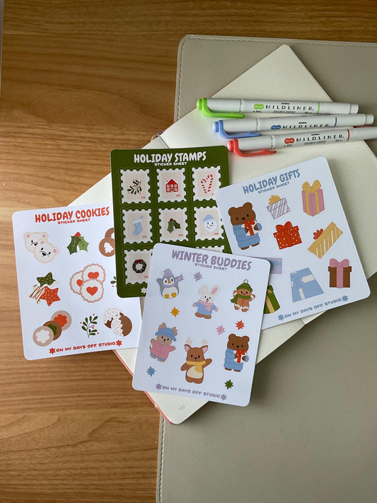 This stationery sticker sheet set of 4 features a holiday theme illustrations. It comes with our Holiday Stamps, Holiday Cookies, Winter Buddies and Holiday Gifts sticker sheets. These glossy stickers are perfect for planners and bullet journals. 