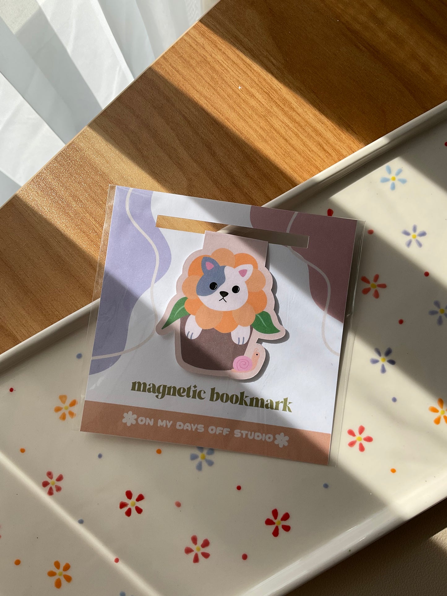 Cat in a flower pot magnetic bookmark