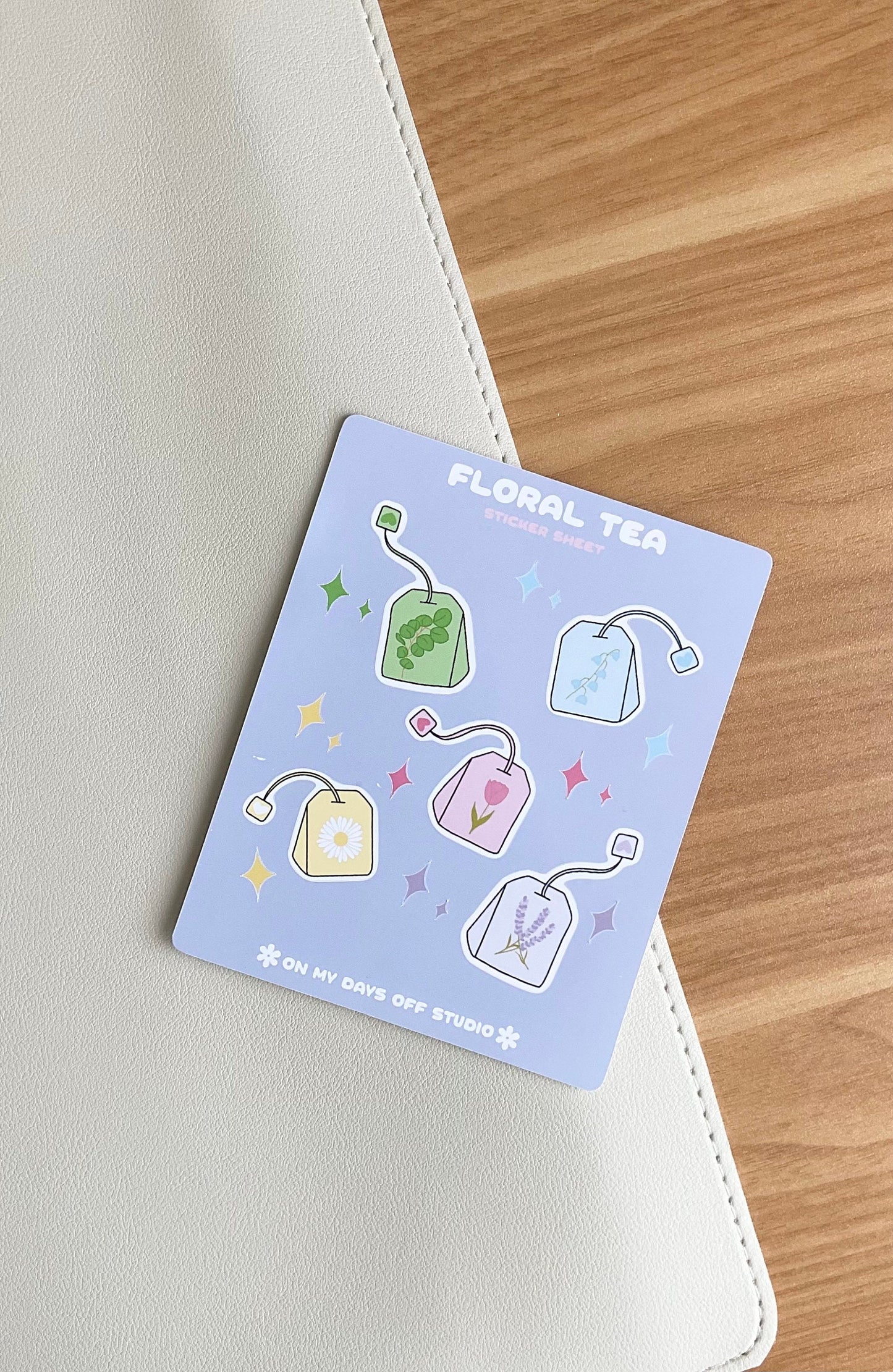 This kawaii floral tea sticker sheet features 5 colorful illustrations. These illustrations feature whimsical tea bags with floral designs. These glossy stickers are perfect for bullet journals and planners. 