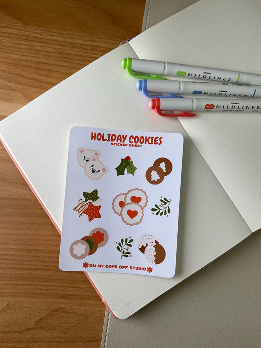 This stationery sticker sheet features a holiday cookies theme and has 9 colorful illustrations. These cookie illustrations includes cookies shaped as stars, mistletoe, polar bear heads, and more. These glossy stickers are perfect for planners and bullet journals. 