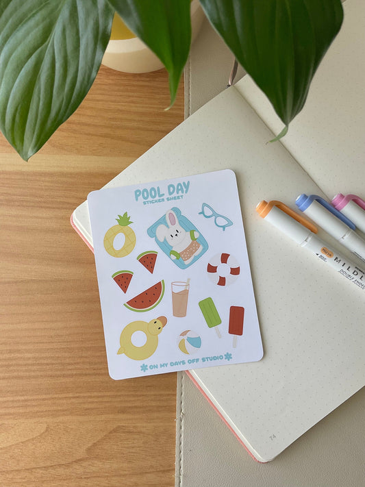 This stationery sticker sheet features a pool day theme and has 12 colorful illustrations. These adorable illustration includes a bunny in swim trunks, pool floats, watermelon, summer drinks, popsicles, and beach ball. These glossy stickers are perfect for planners and bullet journals. 