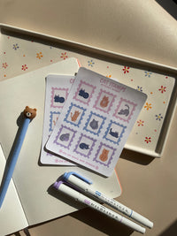 Sticker sheet with 9 cat floral themed stamps. Perfect for your journal spread