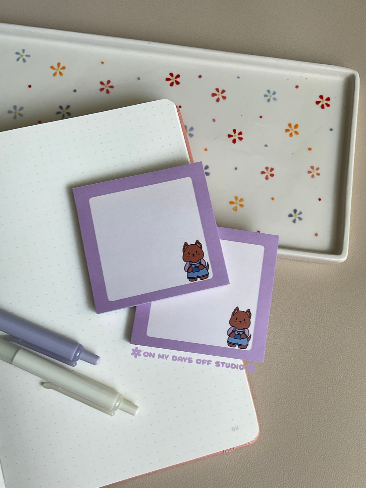 Cute grid background sticky notes with a light purple boarder and adorable character in the right corner. The character is a original with a painters overalls on