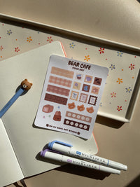 This sticker sheet has decor stickers to help bring color and life.