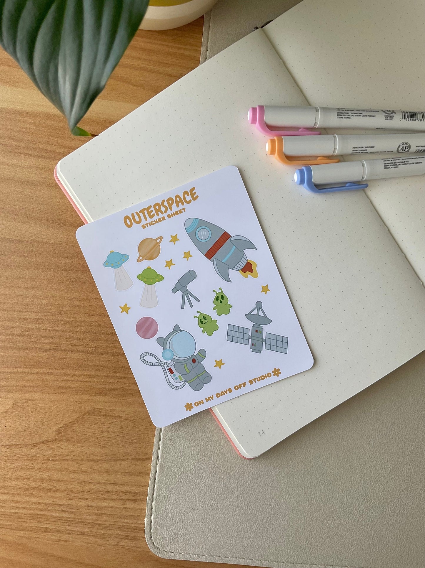 This stationery sticker sheet features a space theme and has 16 colorful illustrations, including a spaceship, cat astronaut, planets, stars, alien spaceship, and more. These glossy stickers are perfect for planners and bullet journals.&nbsp;