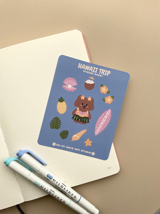 This stationery sticker sheet features a Hawaii Trip theme and has 11 colorful illustrations. This sticker sheet includes a dog in a grass skirt and other island items like a surf board, pineapple, coconut drink, and sea shells. These glossy stickers are perfect for planners and bullet journals.&nbsp;