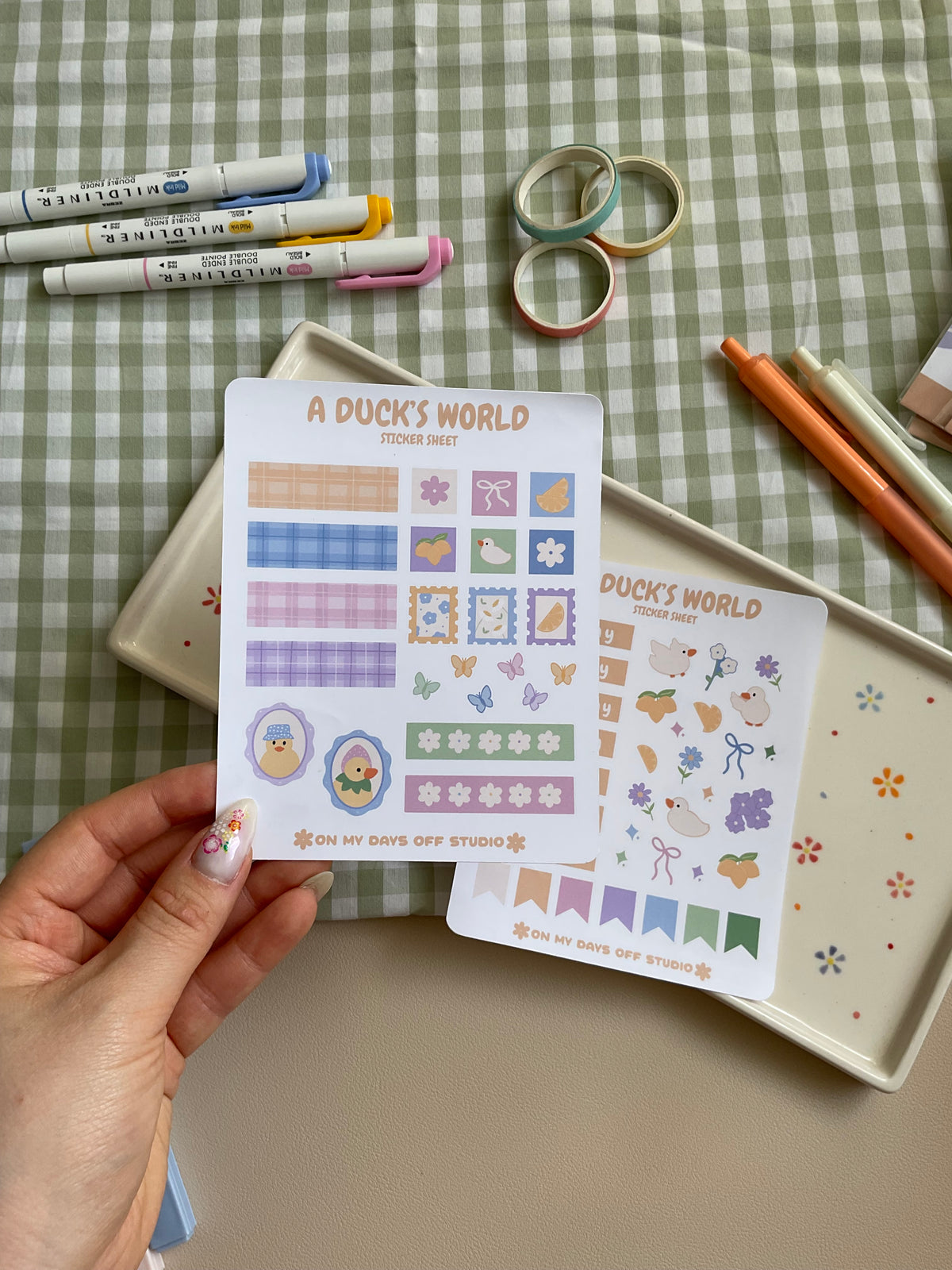 Sticker sheet set with a cute floral and duck theme. One sticker sheet has stickers for each day of the week and decor stickers to help bring color to your planner spread. The second sticker sheet has more decor stickers to help create sections to your journal spread.