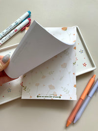 Floral notepad with beige background