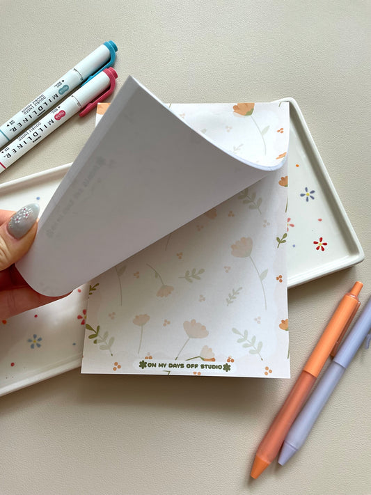Floral notepad with beige background