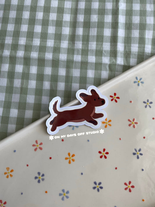 Vinyl sticker of a brown dachshund 