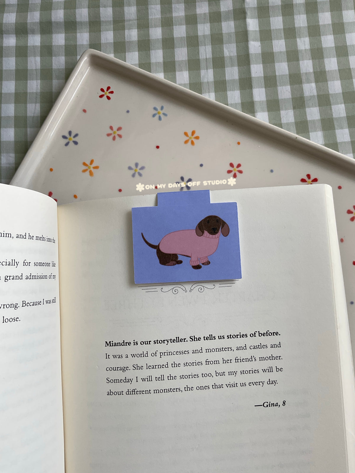 Dachshund wearing a pink sweater magnetic bookmark