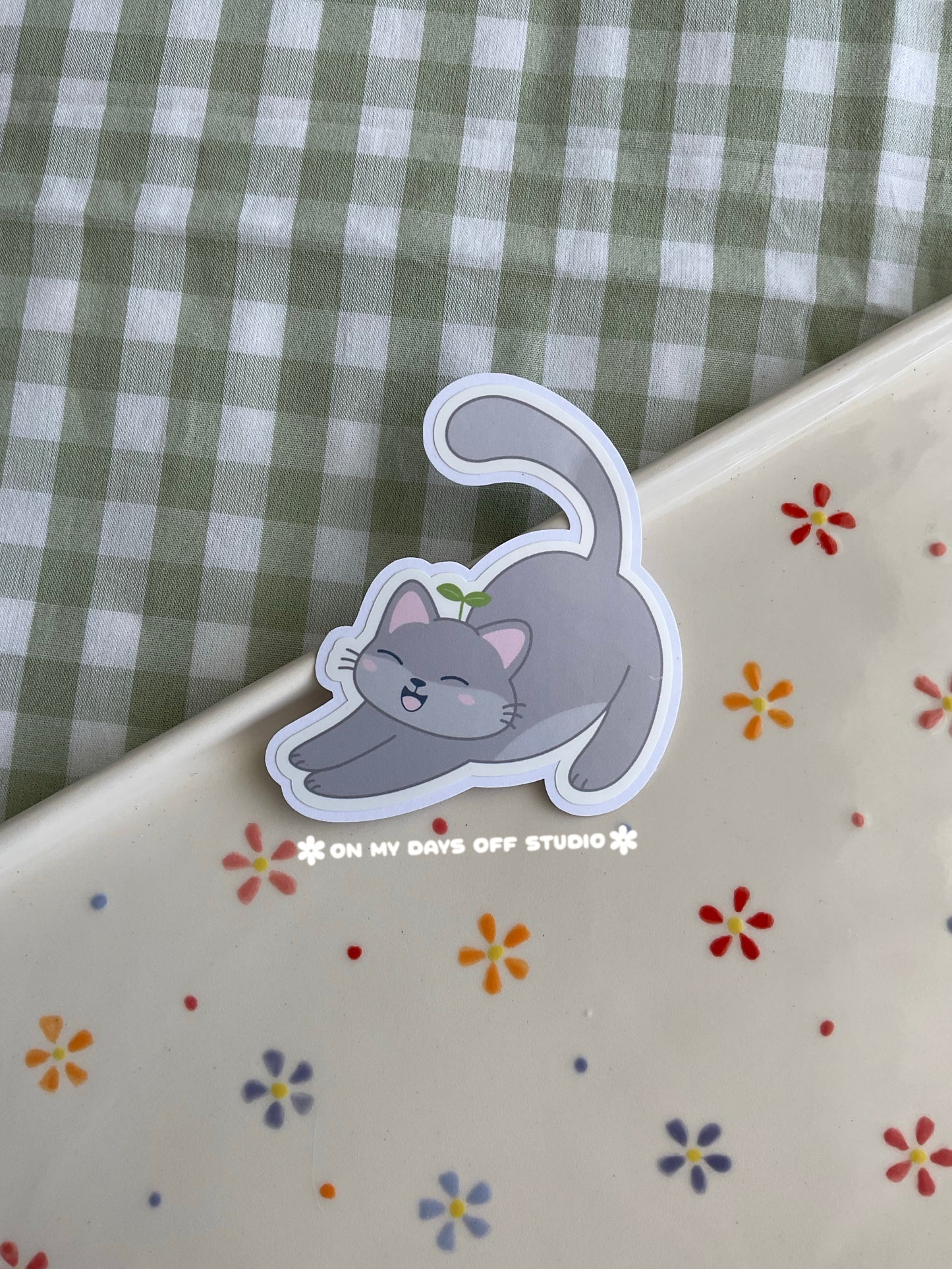 Gray cat vinyl sticker stretching