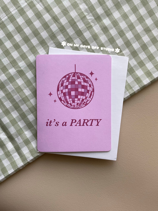 Pink card with disco ball design and 'it's a PARTY' text 